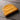 Gold — Native Printful mockup: concrete lifestyle scene.