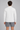AI-generated model simulation of White MT0064, plain back and sleeves; shorts not included