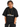 Olvaxe Snow Washed Kids T-Shirt in Black, leaning forward, hands in pockets — AI worn-product simulation, full head